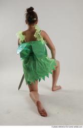 KATERINA KNNELING POSE WITH SWORD